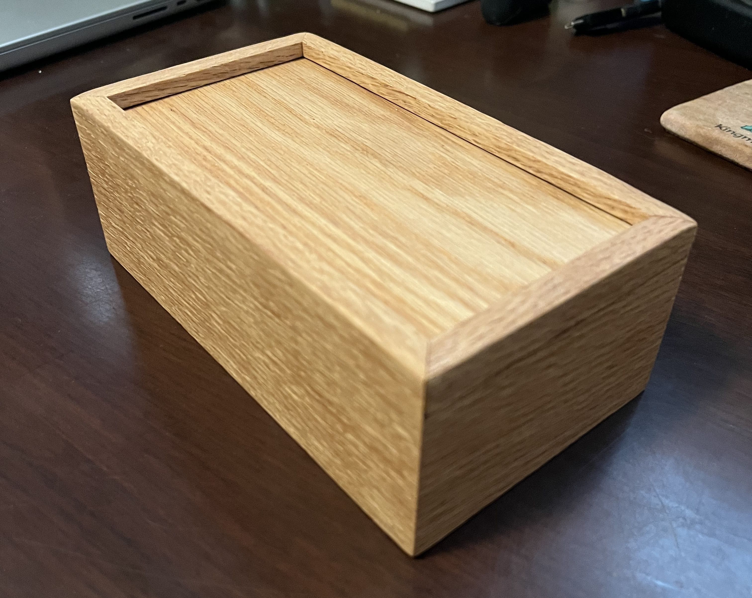 Wooden keepsake box with a sliding top closed